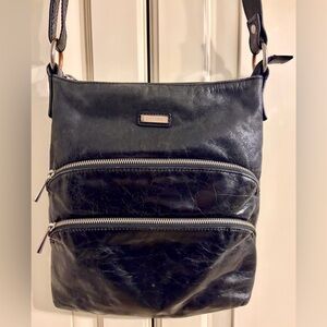 Danier Midnight Black Textured Crossbody Bag. Medium sized.